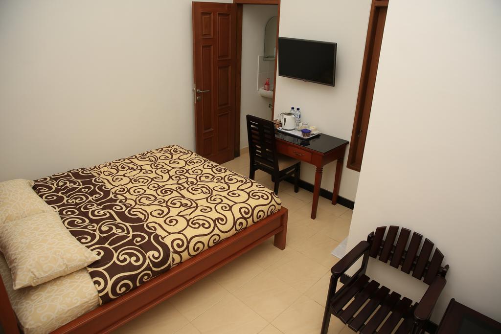 Puri Kusuma Guest House Selemadeg Rum bild